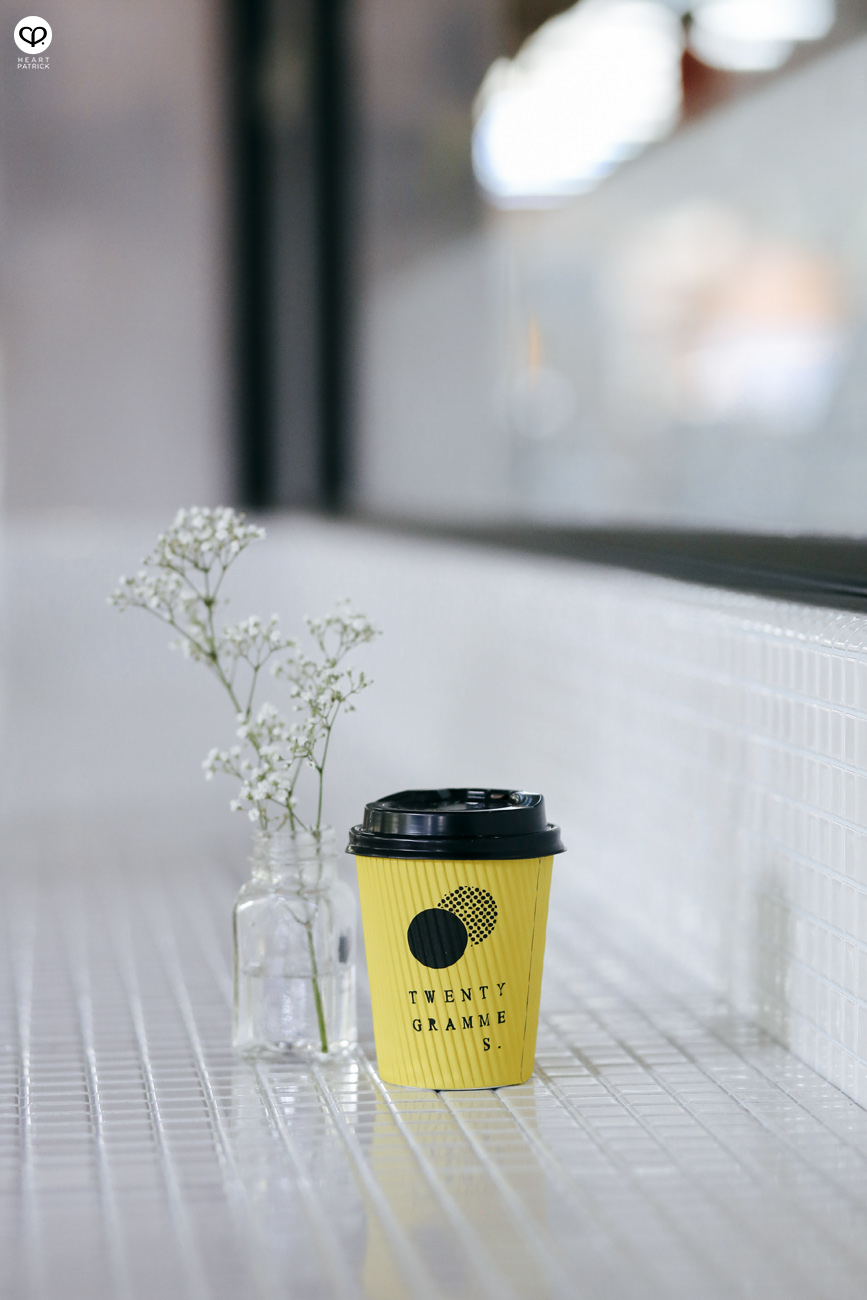 heartpatrick singapore caf cafehopping ang mo kio interior design industrial space yellow coffee takeaway cup
