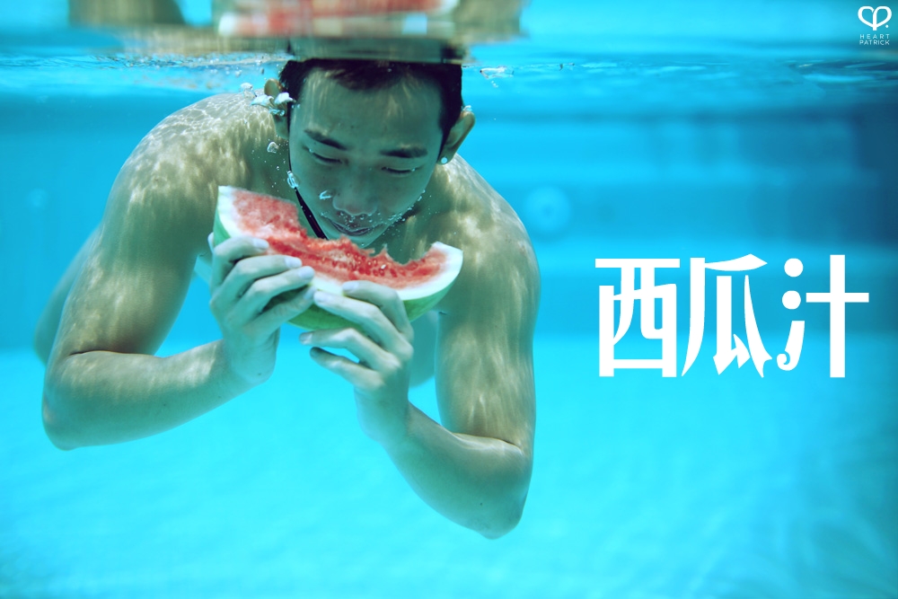 heartpatrick underwater male portrait watermelon conceptual